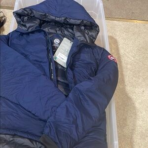 Canada Goose Blue Bomber Jacket with Hood and Quilted Design